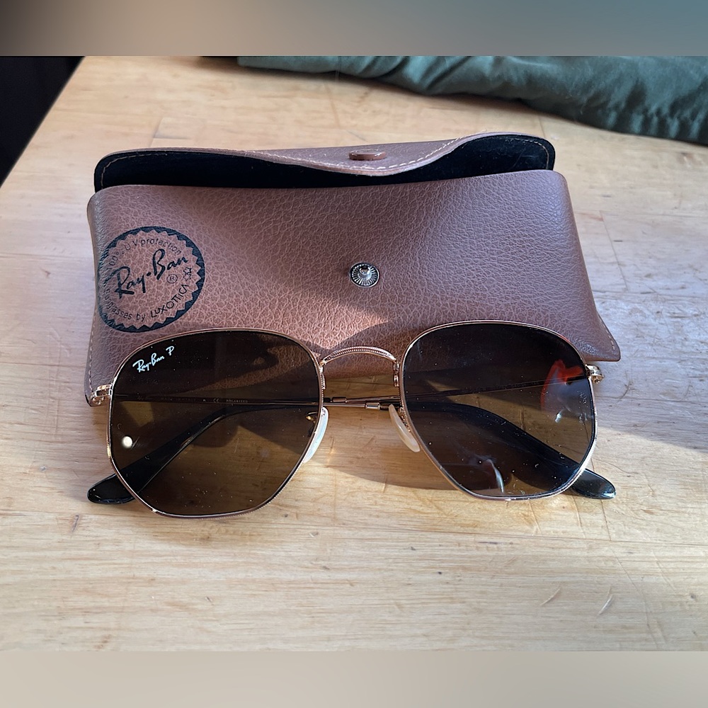 Ray-Ban hexagonal sunglasses. Gold frame, brown lenses.